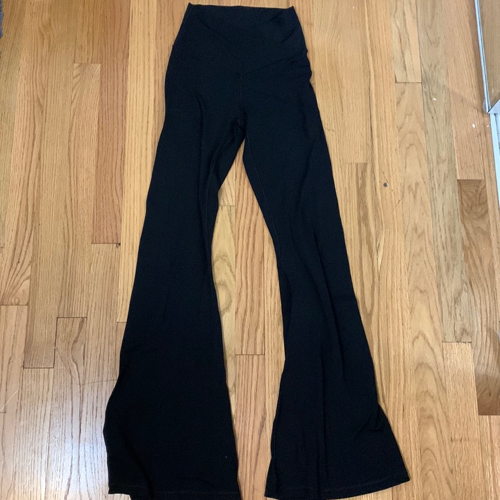 Aerie Cross waist flare leggings in black - size Medium
